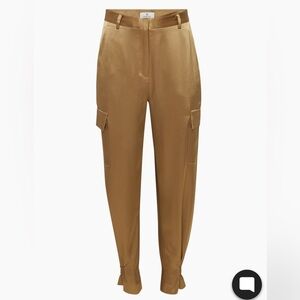 Clothing —
Pants —
Refined Satin Cargo Pant
High-waisted, satin cargo pants